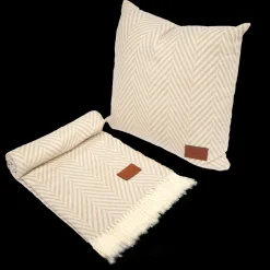 Cuscino e plaid in tessuto